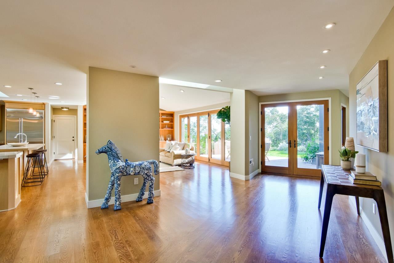 10551 Magdalena Road Los Altos Hills, CA 94024 - Photo 15 of 45 a living room with furniture and a wooden floor