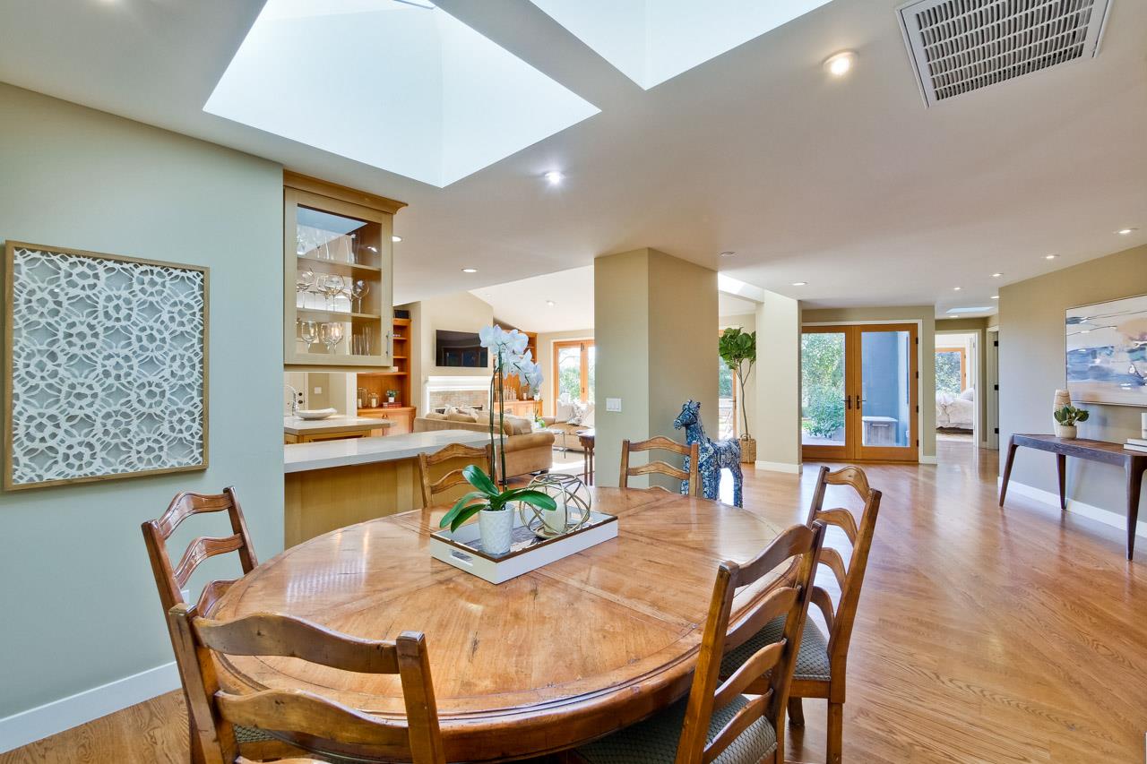 10551 Magdalena Road Los Altos Hills, CA 94024 - Photo 16 of 45 a view of a dining room with furniture and wooden floor