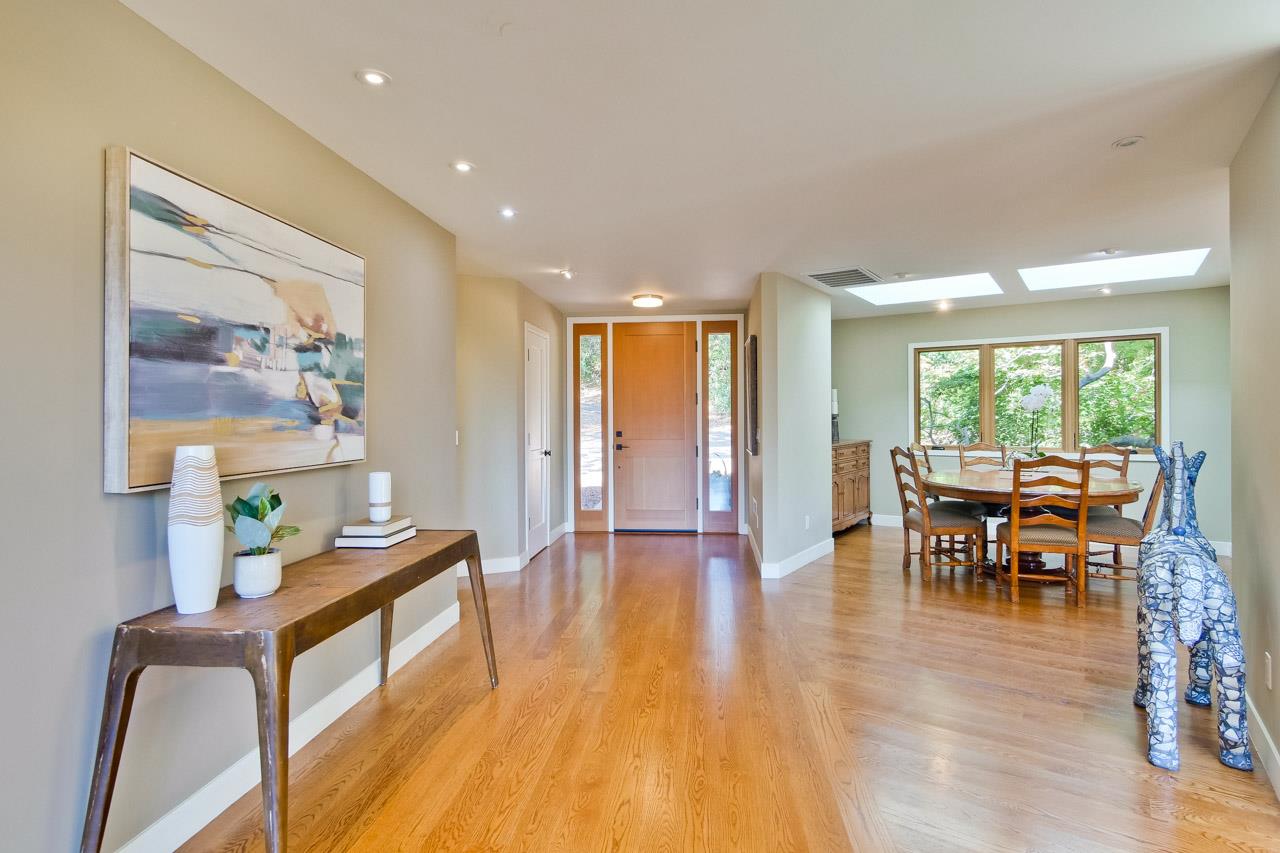 10551 Magdalena Road Los Altos Hills, CA 94024 - Photo 17 of 45 a living room with furniture and wooden floor