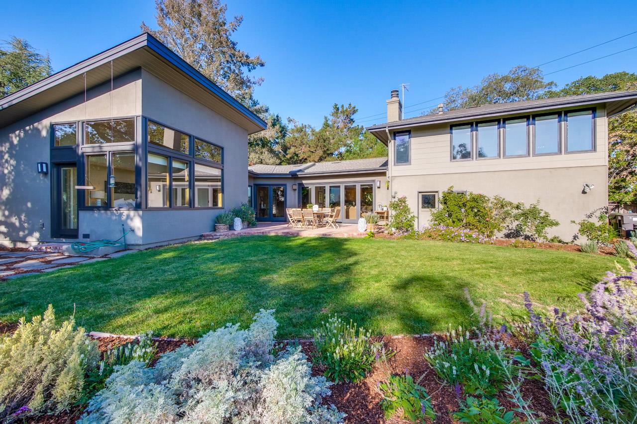 10551 Magdalena Road Los Altos Hills, CA 94024 - Photo 20 of 45 front view of a house with a yard