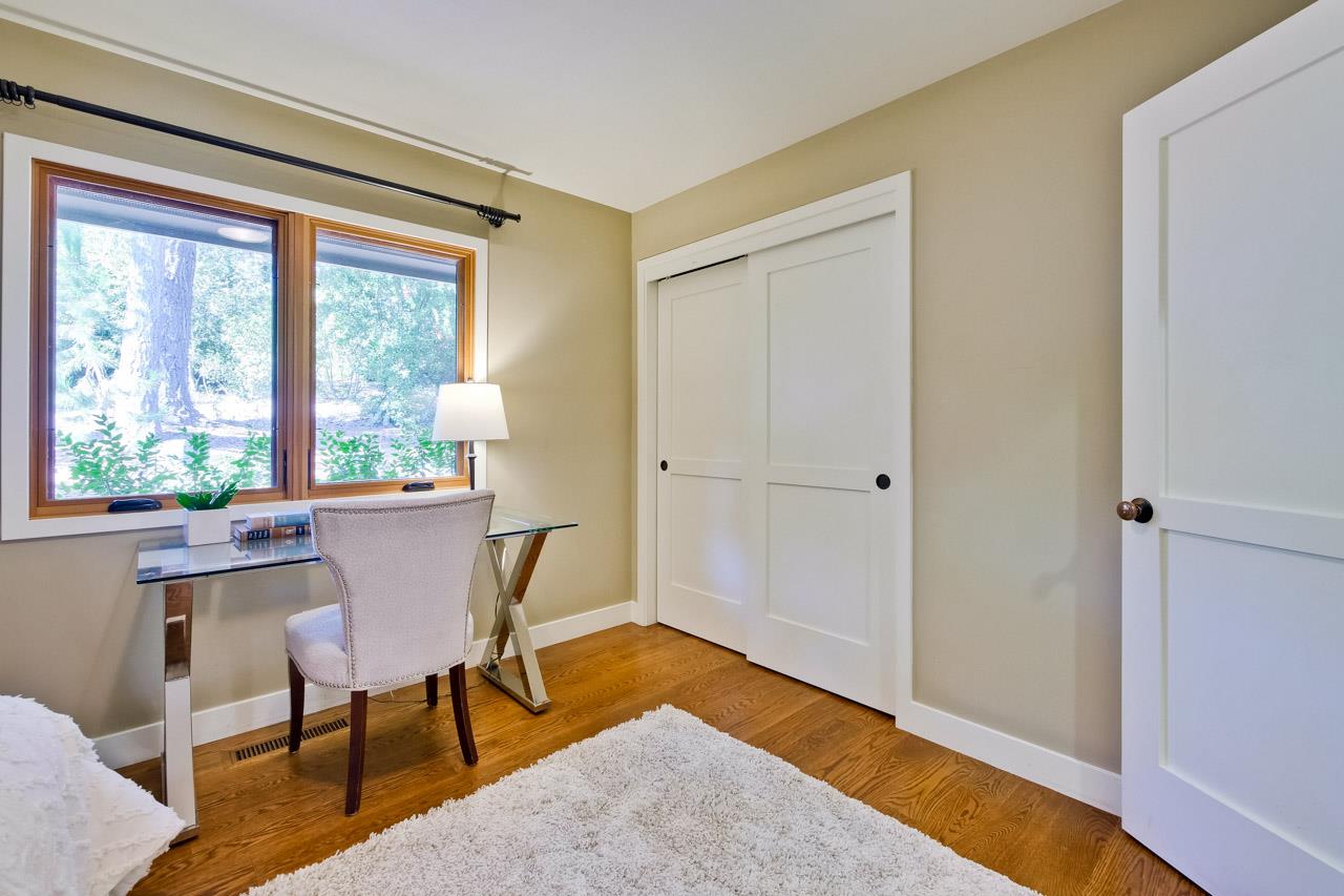 10551 Magdalena Road Los Altos Hills, CA 94024 - Photo 28 of 45 a workspace room with wooden floor and windows