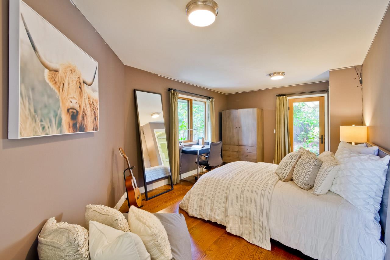 10551 Magdalena Road Los Altos Hills, CA 94024 - Photo 31 of 45 a bedroom with a bed and a window