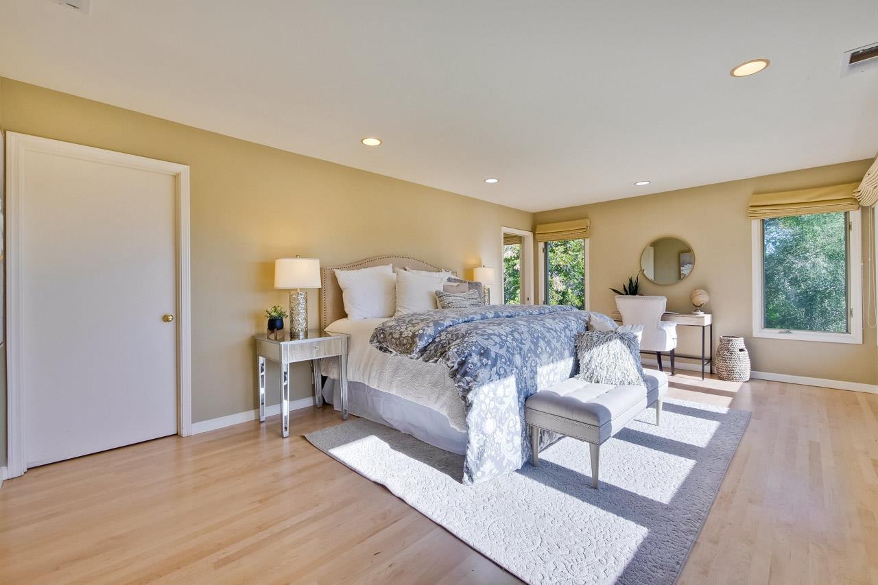 10551 Magdalena Road Los Altos Hills, CA 94024 - Photo 35 of 45 a bed room with furniture and wooden floor