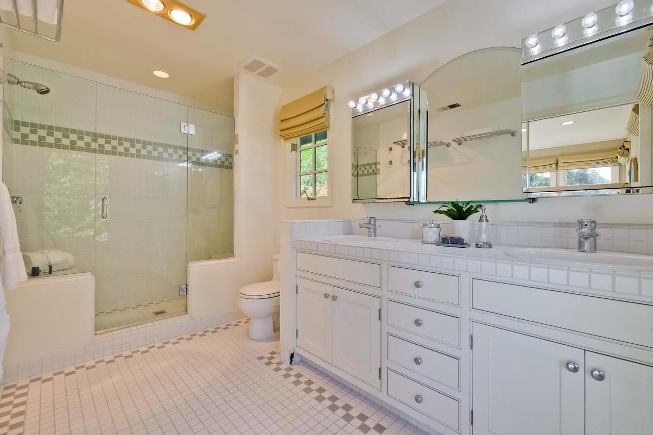 10551 Magdalena Road Los Altos Hills, CA 94024 - Photo 37 of 45 a spacious bathroom with double sink shower and a mirror