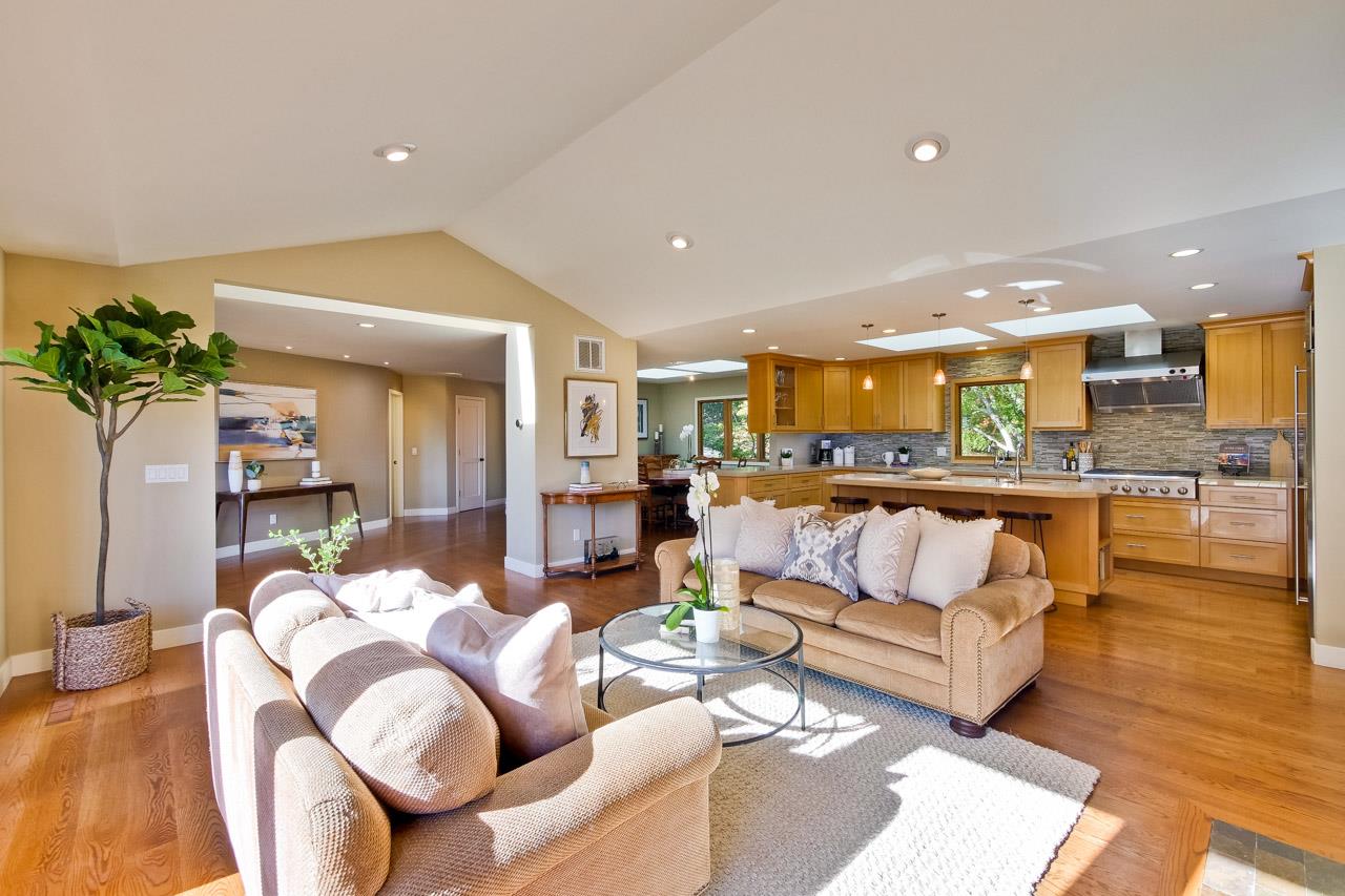 10551 Magdalena Road Los Altos Hills, CA 94024 - Photo 5 of 45 a living room with furniture and kitchen view