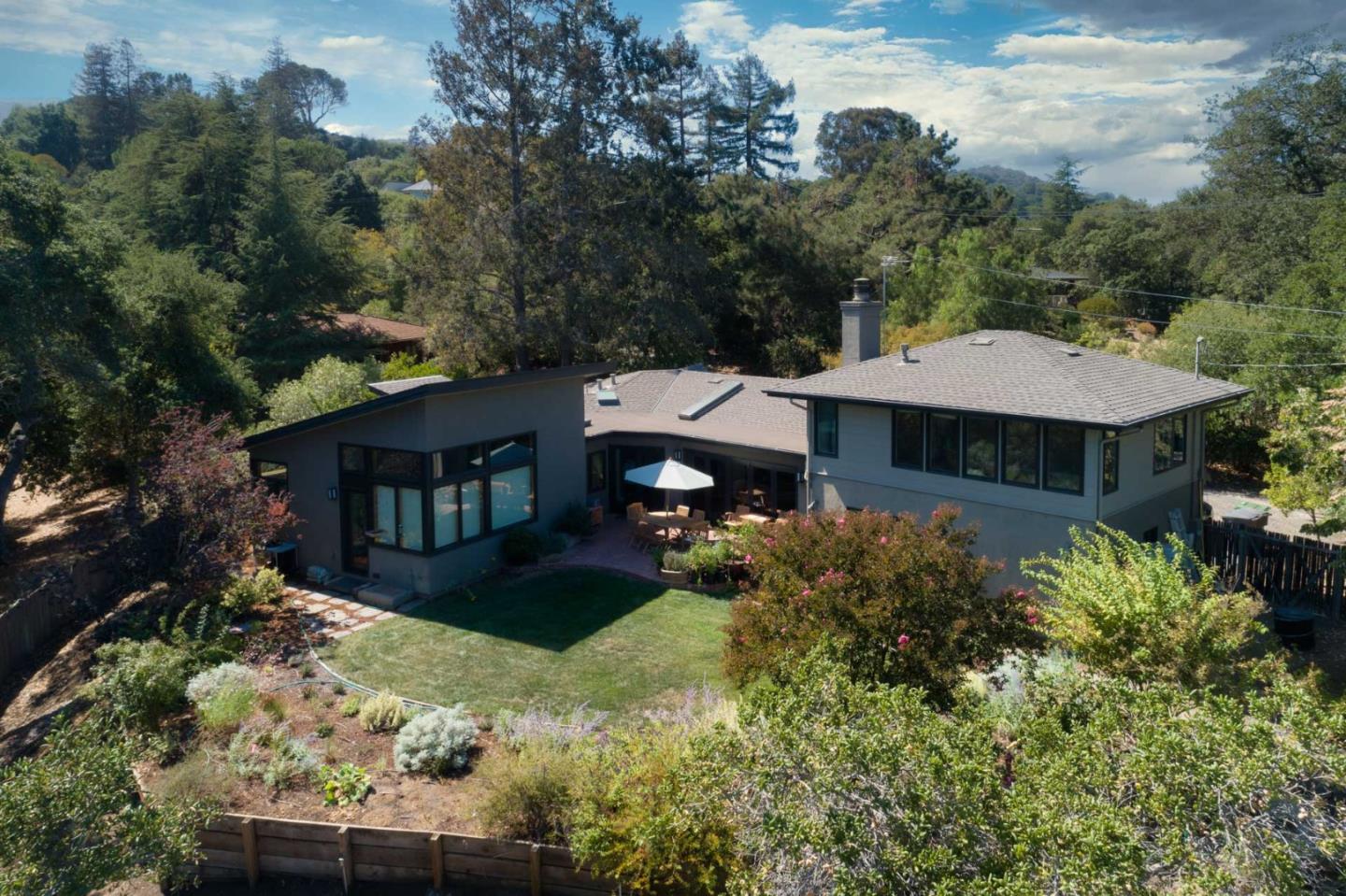 10551 Magdalena Road Los Altos Hills, CA 94024 - Photo 44 of 45 a front view of a house with a yard