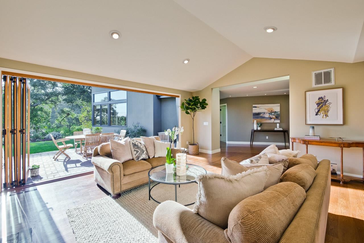 10551 Magdalena Road Los Altos Hills, CA 94024 - Photo 6 of 45 a living room with furniture and a large window
