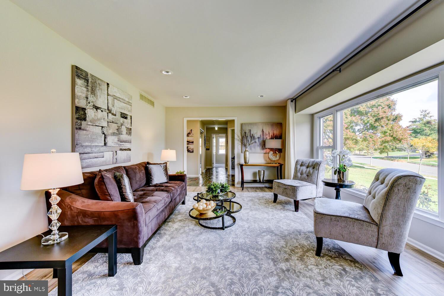 5 Glengarry Way Princeton Junction, NJ 08550 - Photo 11 of 63 a living room with furniture and a large window