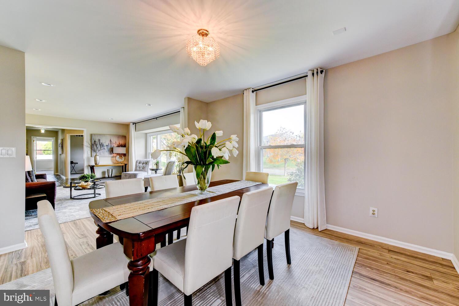 5 Glengarry Way Princeton Junction, NJ 08550 - Photo 14 of 63 a view of a dining room with furniture window and wooden floor