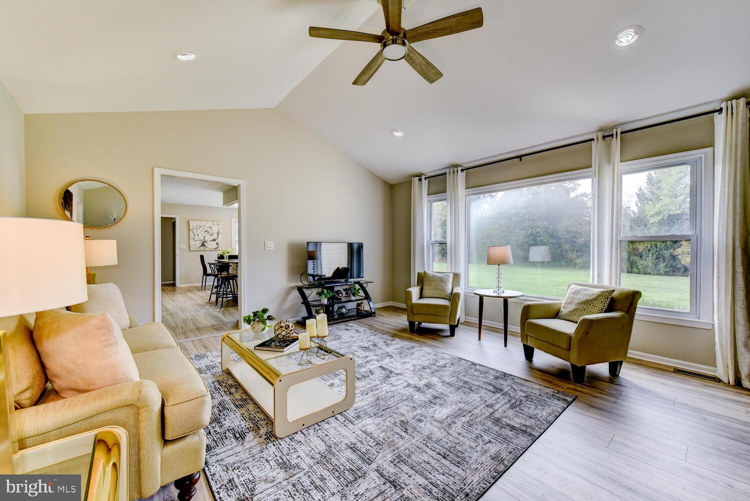5 Glengarry Way Princeton Junction, NJ 08550 - Photo 17 of 63 a living room with furniture and a large window
