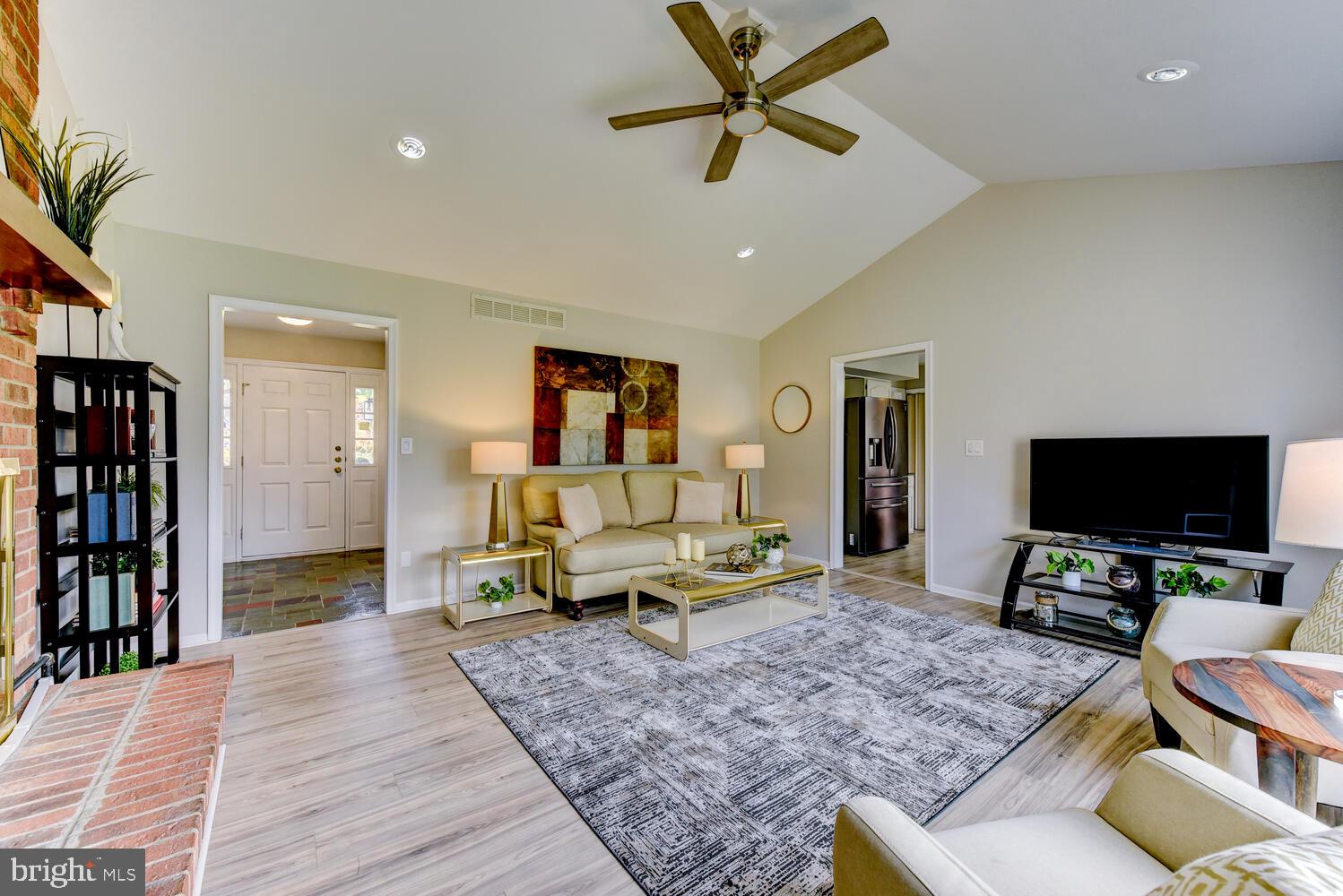 5 Glengarry Way Princeton Junction, NJ 08550 - Photo 18 of 63 a living room with furniture and a flat screen tv