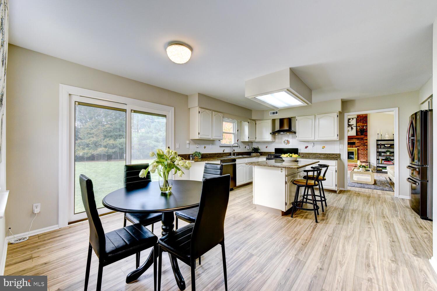 5 Glengarry Way Princeton Junction, NJ 08550 - Photo 20 of 63 a view of a dining room with furniture and wooden floor