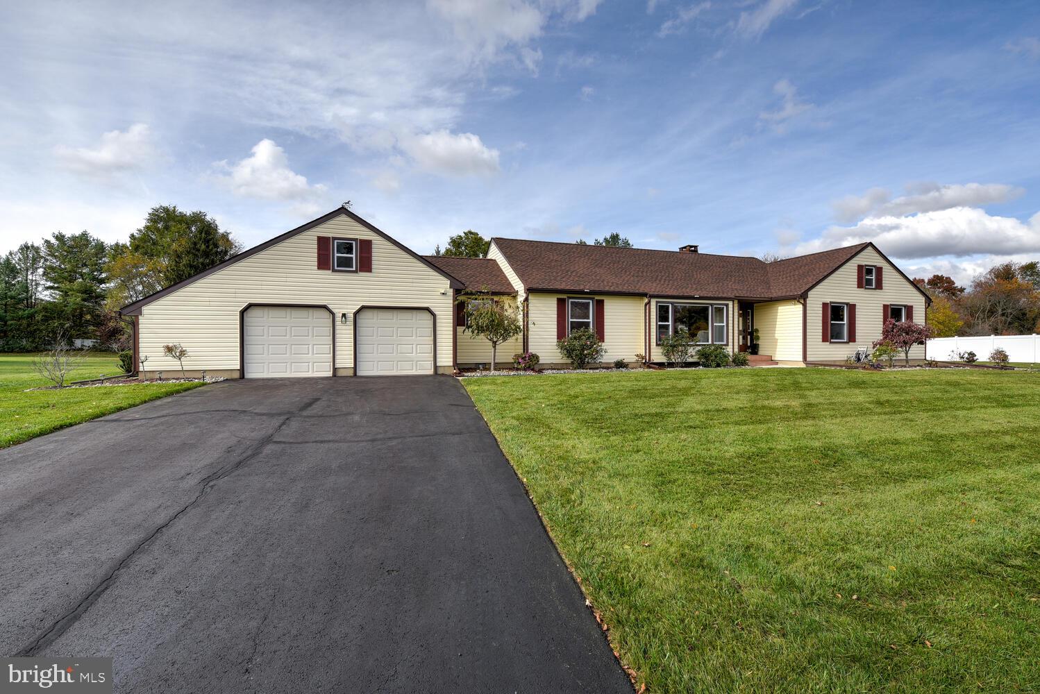 5 Glengarry Way Princeton Junction, NJ 08550 - Photo 6 of 63 a view of a house with a yard and garage