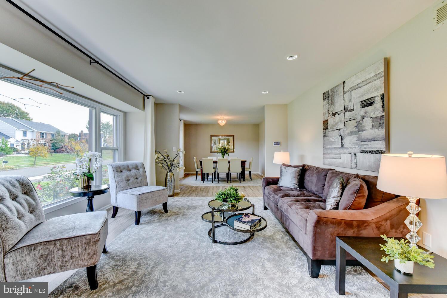 5 Glengarry Way Princeton Junction, NJ 08550 - Photo 8 of 63 a living room with furniture and a large window