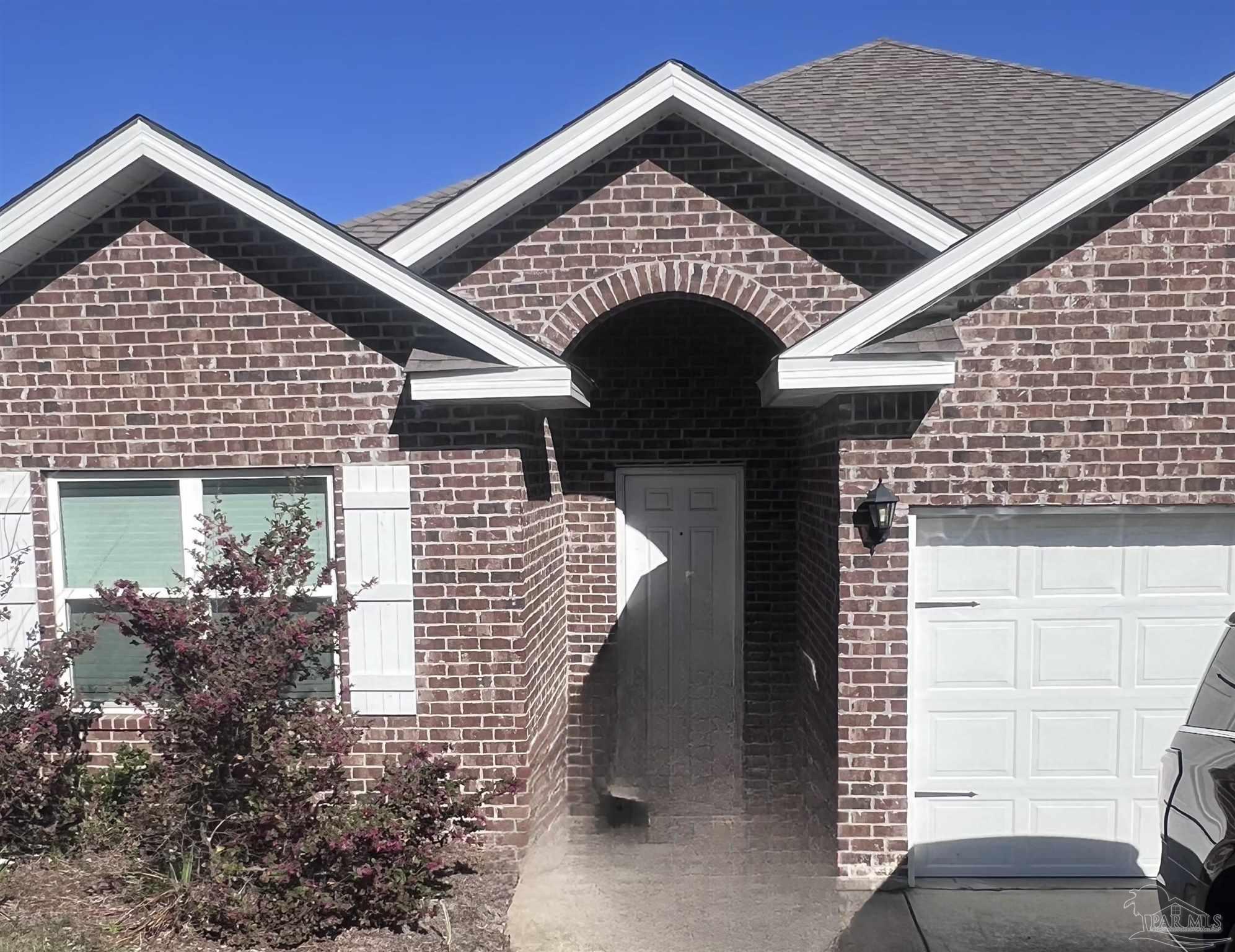 12927 Sanderling Loop Daphne, AL 36527 - Photo 1 of 1 a front view of a house