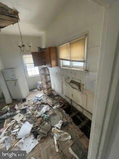 1108 West 3rd Street Chester, PA 19013 - Photo 16 of 75 a room with water heater and wooden floor