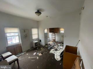 1108 West 3rd Street Chester, PA 19013 - Photo 22 of 75 a living room with furniture and a window