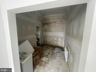 1108 West 3rd Street Chester, PA 19013 - Photo 36 of 75 a bathroom with a granite countertop shower and a sink