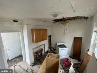 1108 West 3rd Street Chester, PA 19013 - Photo 54 of 75 a view of a livingroom with furniture and a flat screen tv