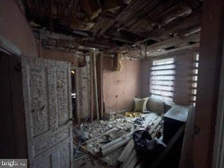 1108 West 3rd Street Chester, PA 19013 - Photo 66 of 75 a bedroom with a bed and a window