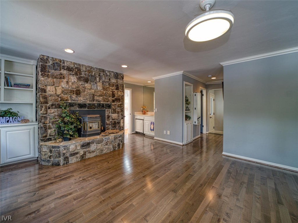 714 Champagne Road Incline Village, NV 89451 - Photo 16 of 29 a view of a livingroom with wooden floor and a fireplace