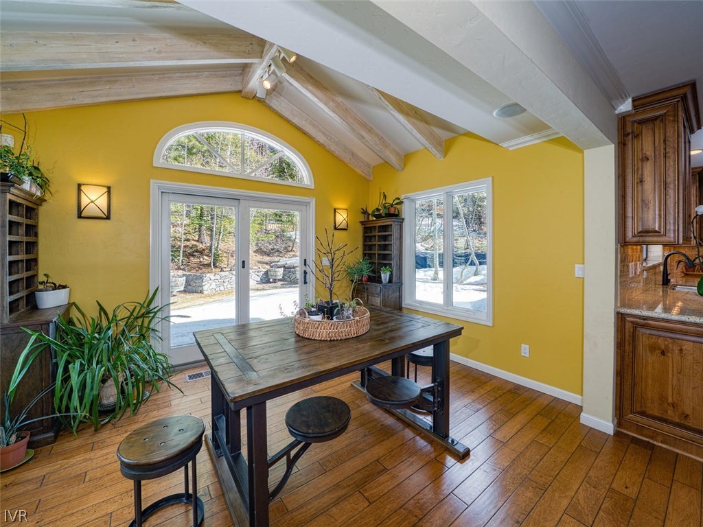 714 Champagne Road Incline Village, NV 89451 - Photo 5 of 29 a view of a dining room with furniture window and wooden floor
