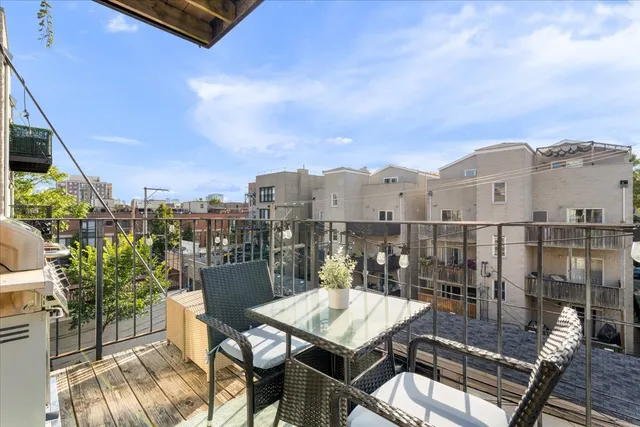 a view of a terrace with furniture