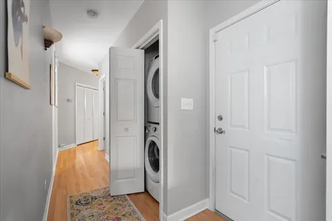 a bathroom with a granite countertop shower and a sink