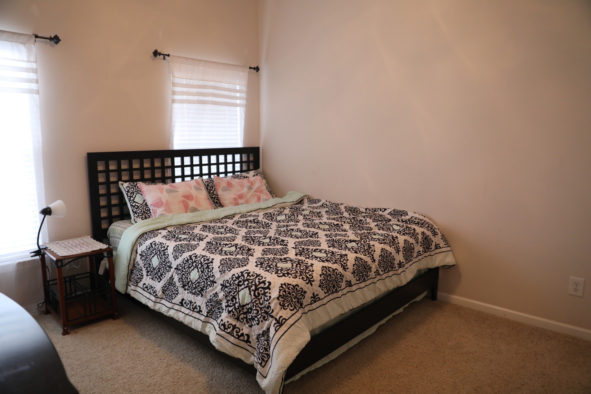 1019 Queens Place Spring Hill, TN 37174 - Photo 12 of 18 a bed sitting in a bedroom next to a window