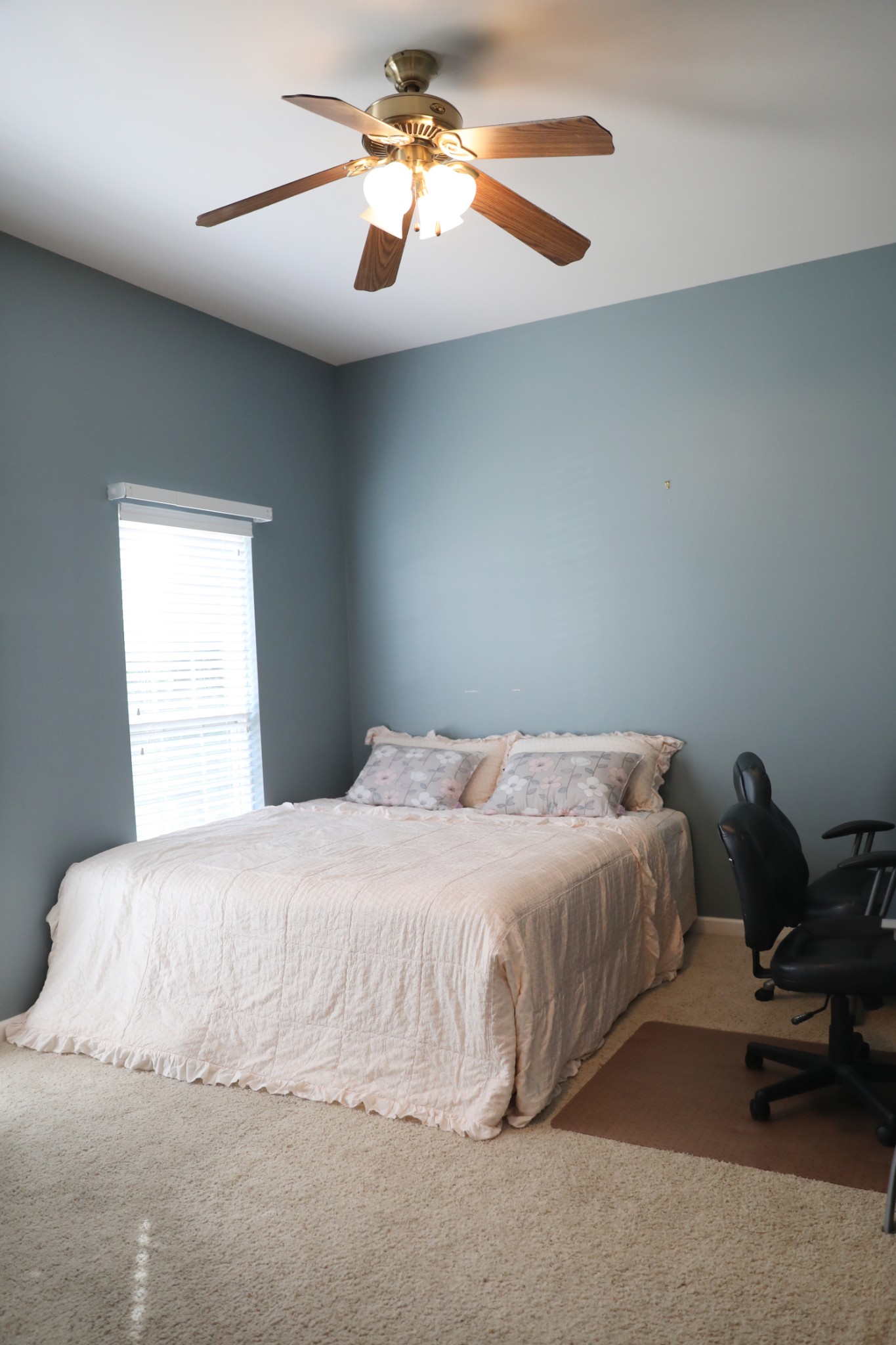 1019 Queens Place Spring Hill, TN 37174 - Photo 13 of 18 a bedroom with a bed and a chandelier