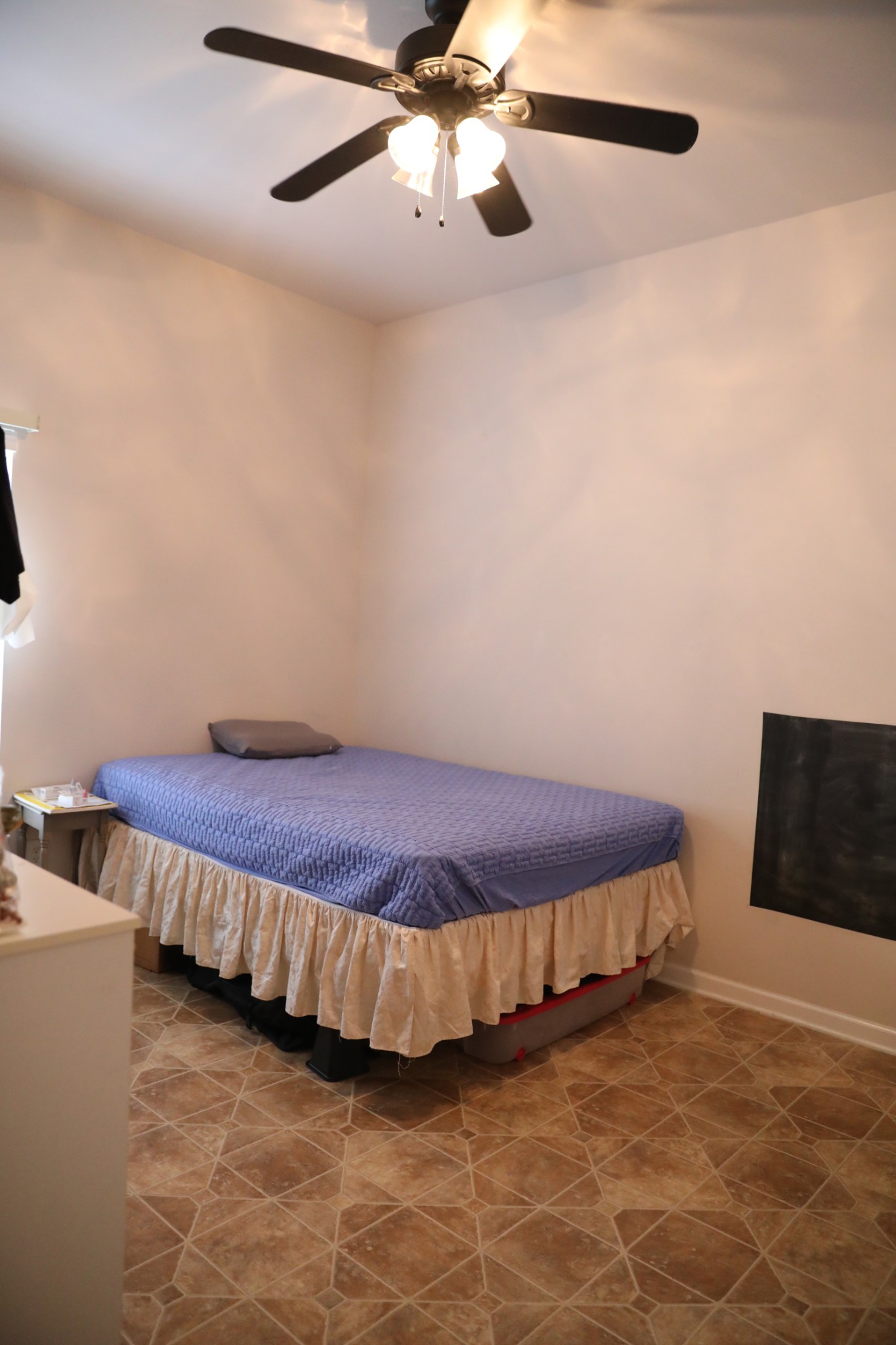 1019 Queens Place Spring Hill, TN 37174 - Photo 14 of 18 a spacious bedroom with a bed and a ceiling fan