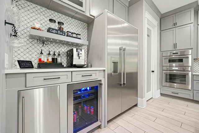 a view of a livingroom with wooden floor and window