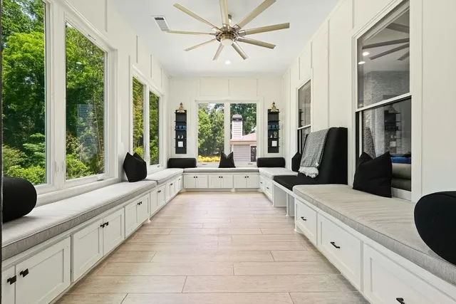 a spacious bathroom with a double vanity sink mirror and double