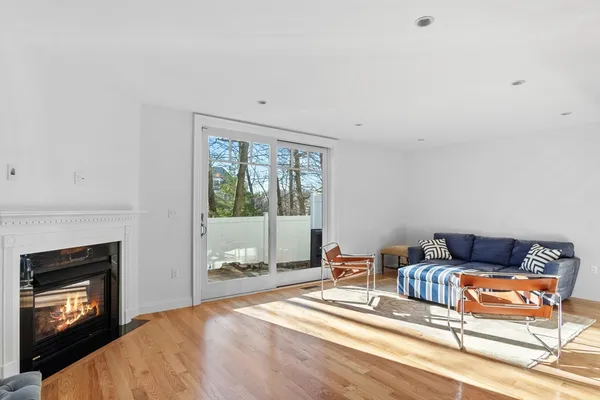 a bedroom with a bed and a fireplace