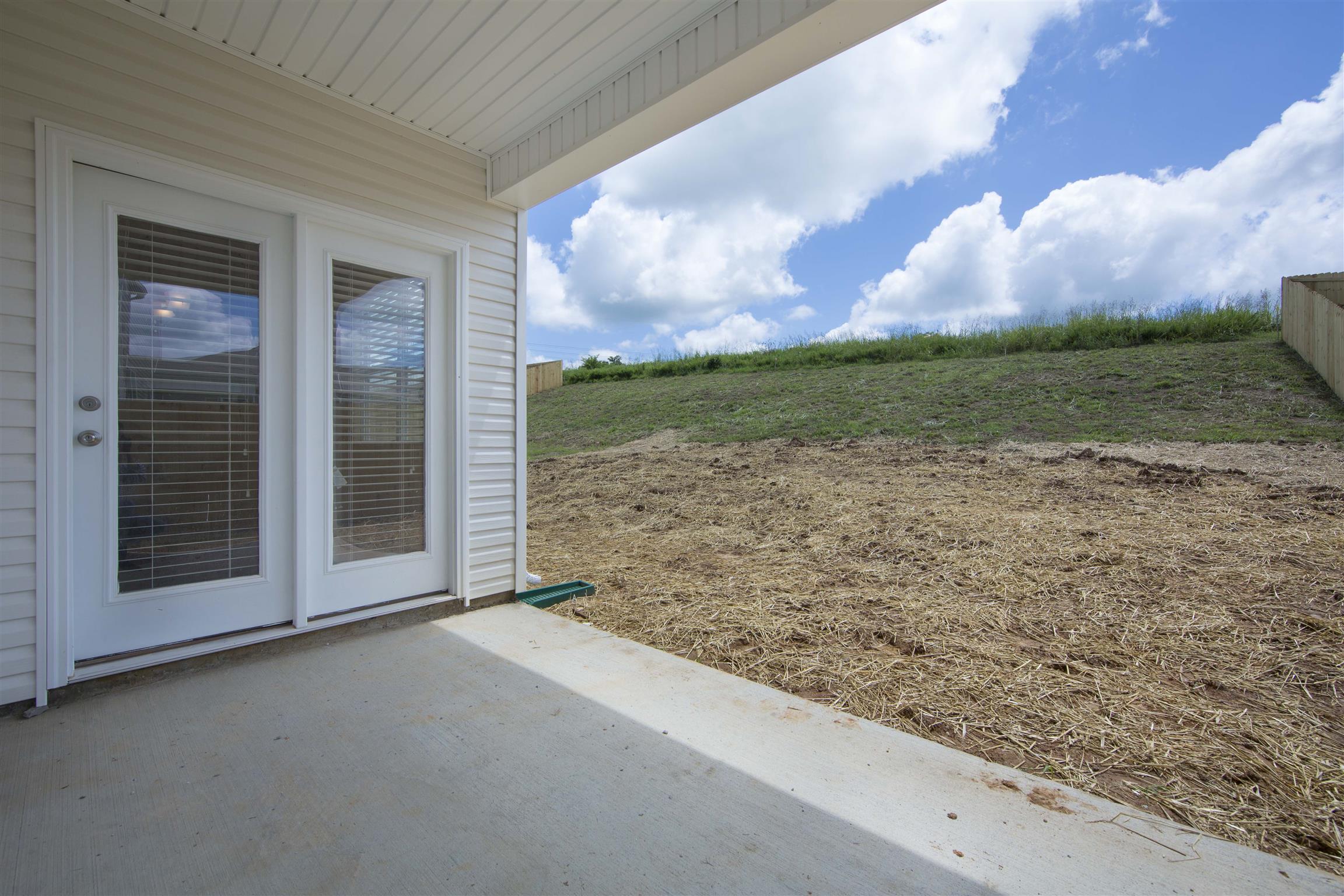 615 Prominence Road, Unit 39 Columbia, TN 38401 - Photo 15 of 15 Covered Porch - Photos are of same floor plan - Construction on lot 63 has not started.
