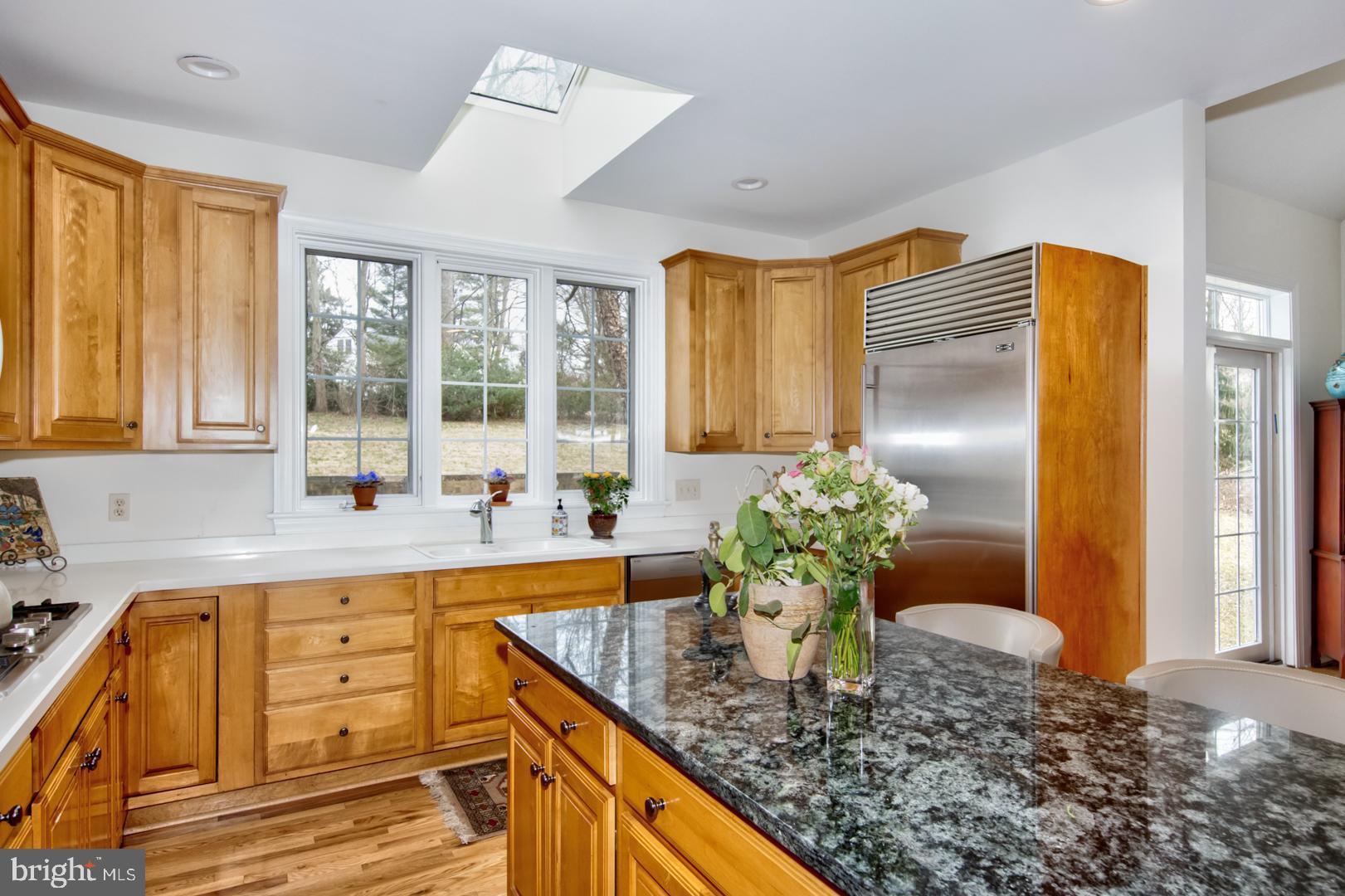 985 South Waterloo Road Devon, PA 19333 - Photo 21 of 64 The kitchen Island with granite