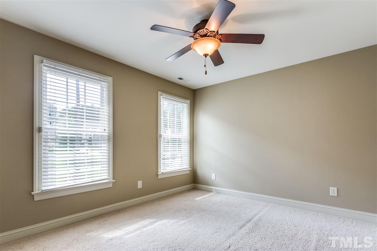 3509 Griffice Mill Road Raleigh, NC 27610 - Photo 14 of 20 a view of an empty room with a window