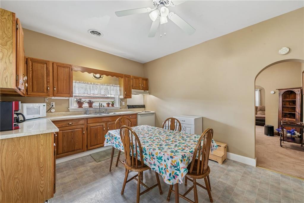 310 Bungalow Road New Alexandria, PA 15670 - Photo 12 of 30 a view of a dining room with furniture and chandelier