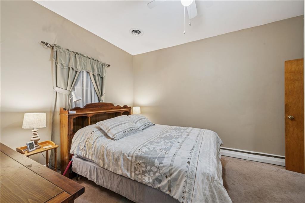 310 Bungalow Road New Alexandria, PA 15670 - Photo 15 of 30 a bedroom with a bed and painting on the wall