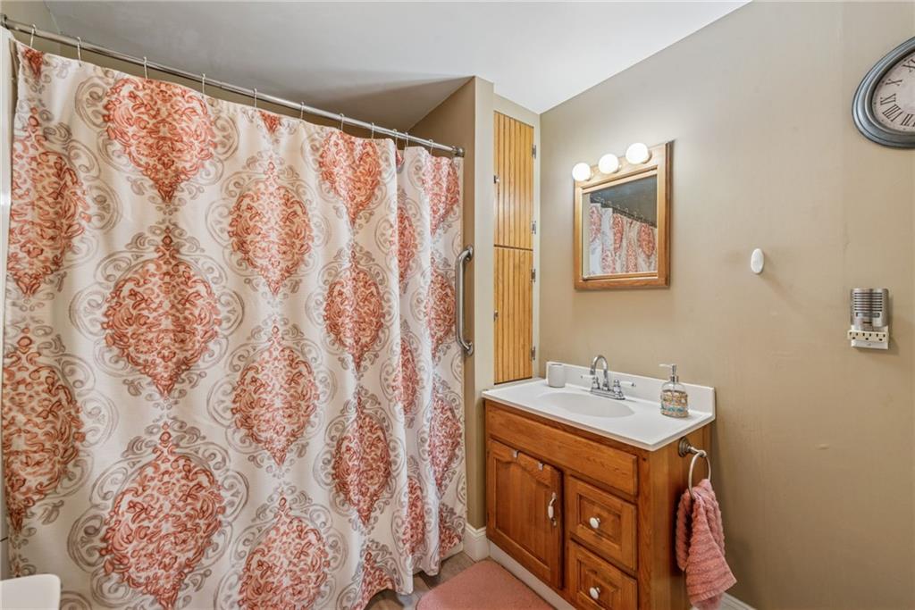 310 Bungalow Road New Alexandria, PA 15670 - Photo 17 of 30 a bathroom with a sink and a mirror