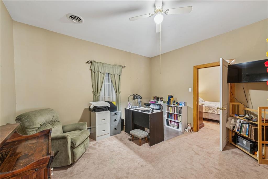 310 Bungalow Road New Alexandria, PA 15670 - Photo 18 of 30 a view of a workspace with furniture and a window