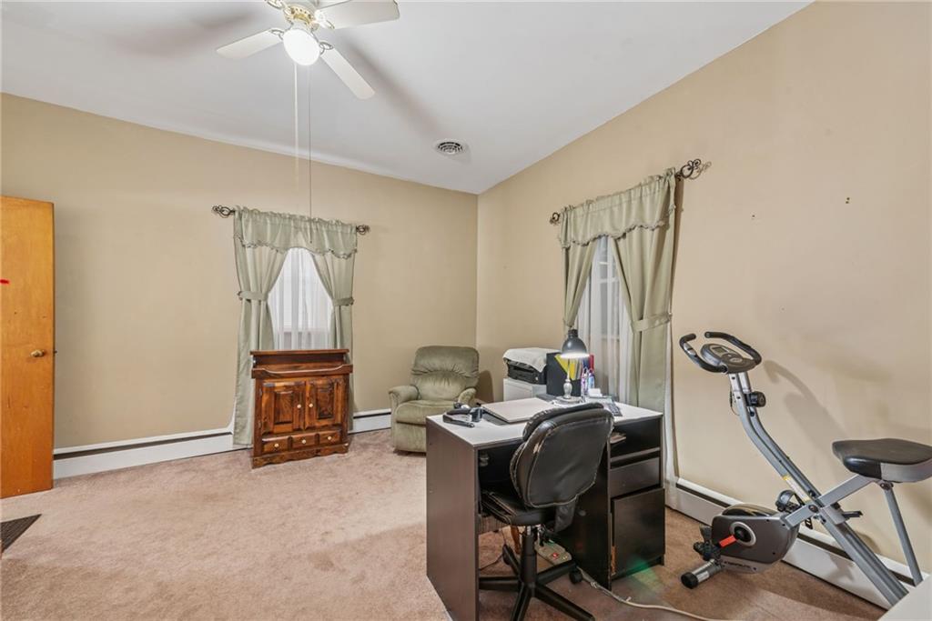 310 Bungalow Road New Alexandria, PA 15670 - Photo 19 of 30 a view of a workspace with furniture and a ceiling fan