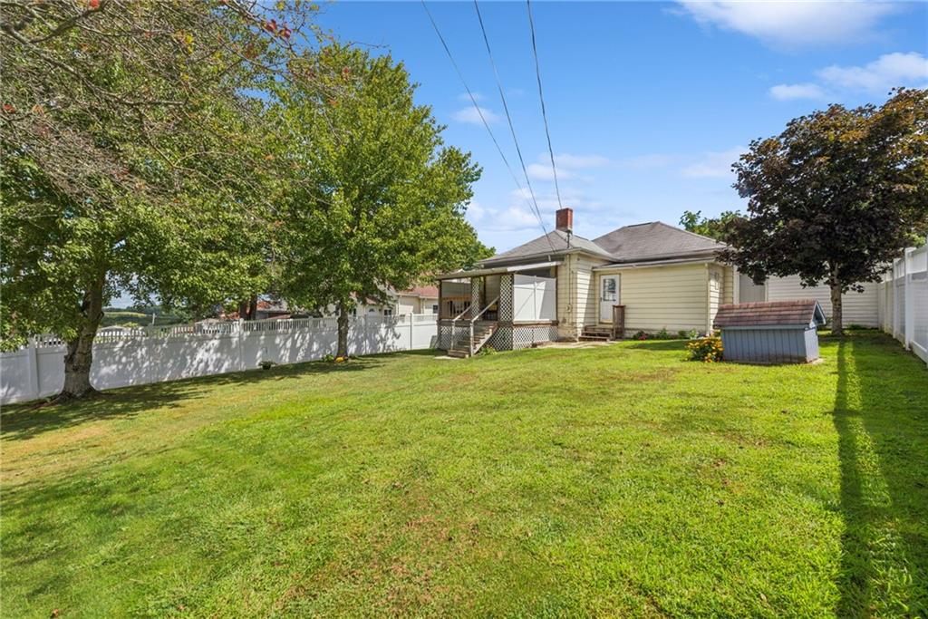310 Bungalow Road New Alexandria, PA 15670 - Photo 24 of 30 a front view of a house with a garden
