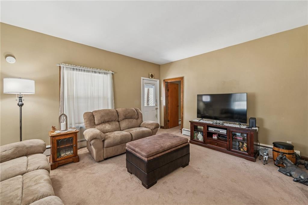 310 Bungalow Road New Alexandria, PA 15670 - Photo 5 of 30 a living room with furniture and a flat screen tv