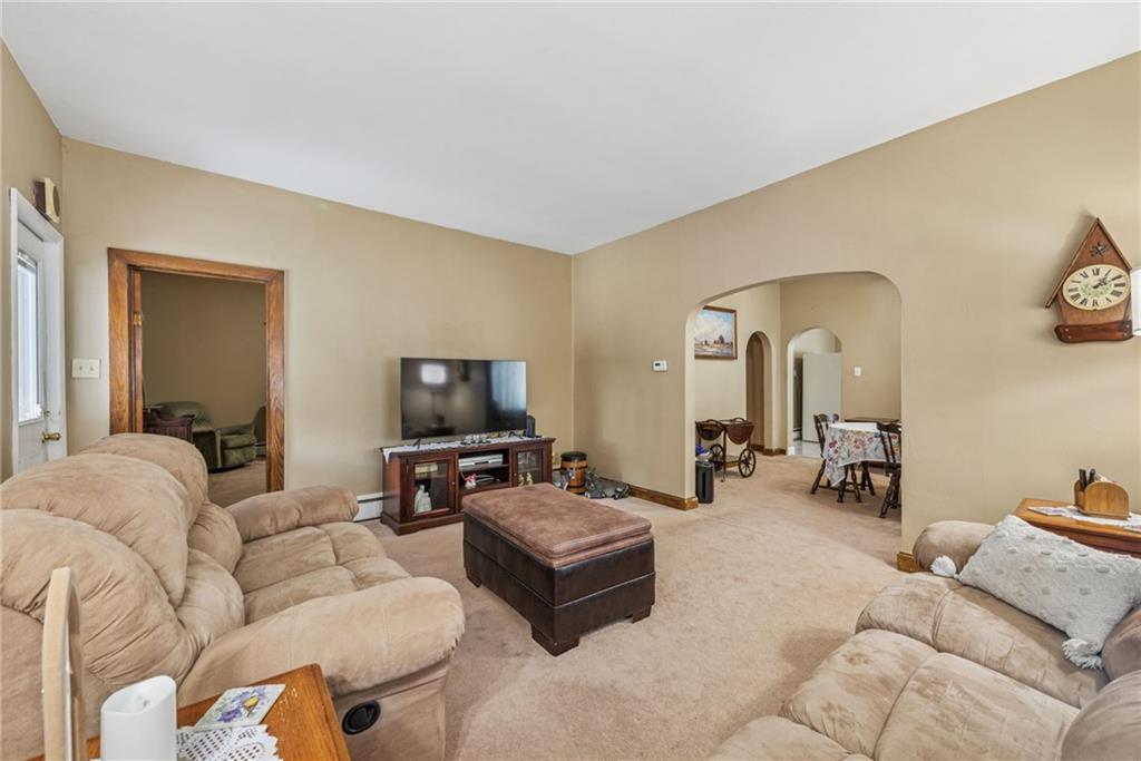 310 Bungalow Road New Alexandria, PA 15670 - Photo 6 of 30 a living room with furniture and a flat screen tv