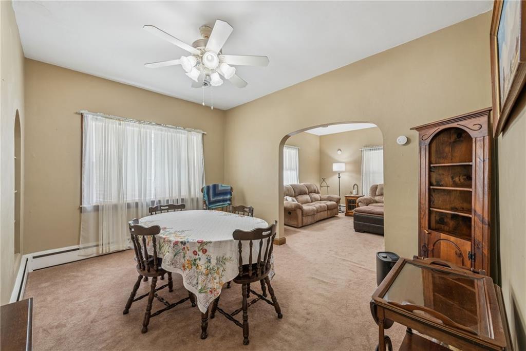 310 Bungalow Road New Alexandria, PA 15670 - Photo 7 of 30 a view of a dining room with furniture and a chandelier