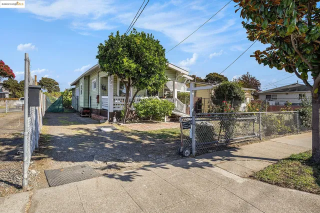 a view of a house with a street