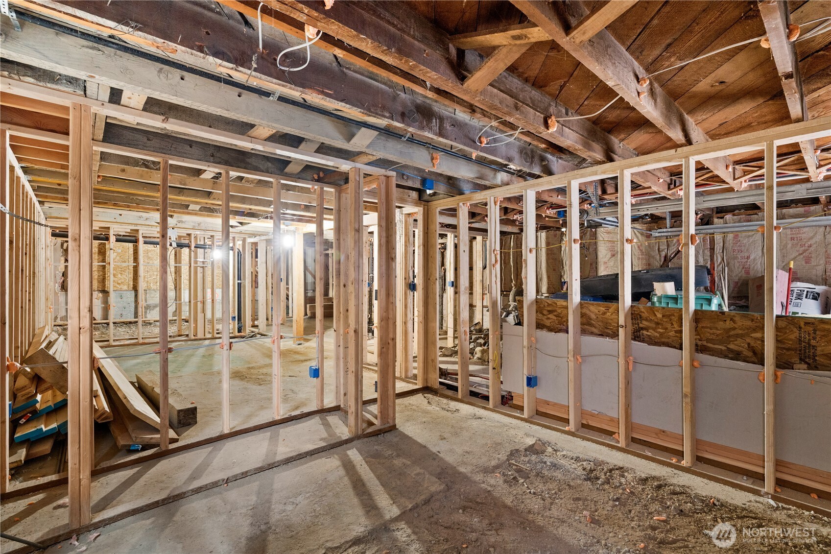 2212 North 46th Street Seattle, WA 98103 - Photo 19 of 25 a view of an empty room with wooden floor
