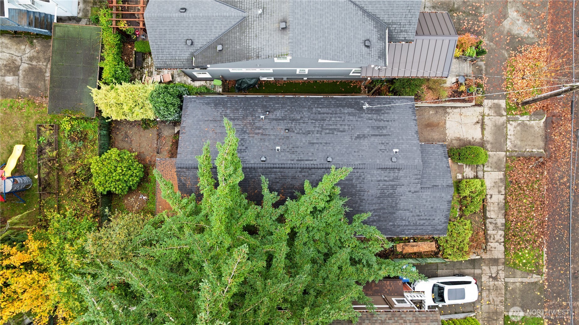 2212 North 46th Street Seattle, WA 98103 - Photo 23 of 25 an aerial view of residential houses with outdoor space