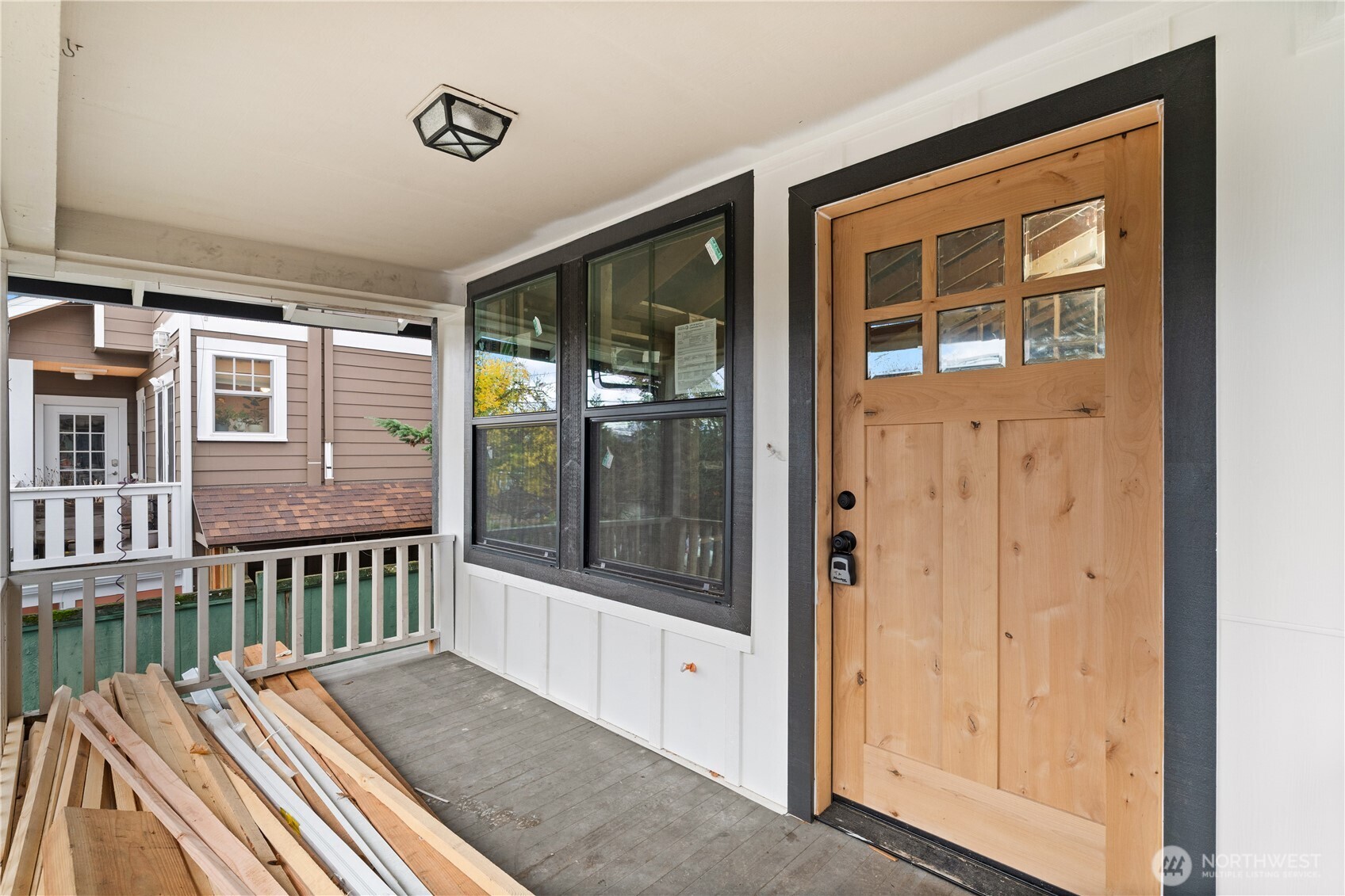 2212 North 46th Street Seattle, WA 98103 - Photo 5 of 25 a view of a house with a porch